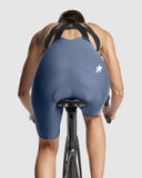Assos Dyora R bib shorts on rider, back
